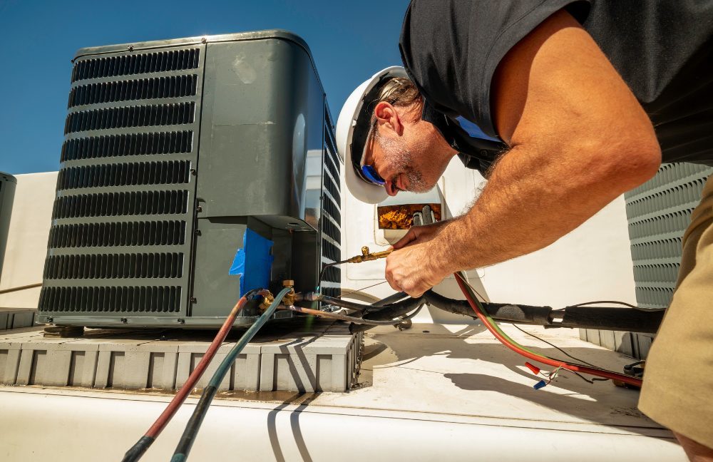 Air Conditioning Technician working on a unit